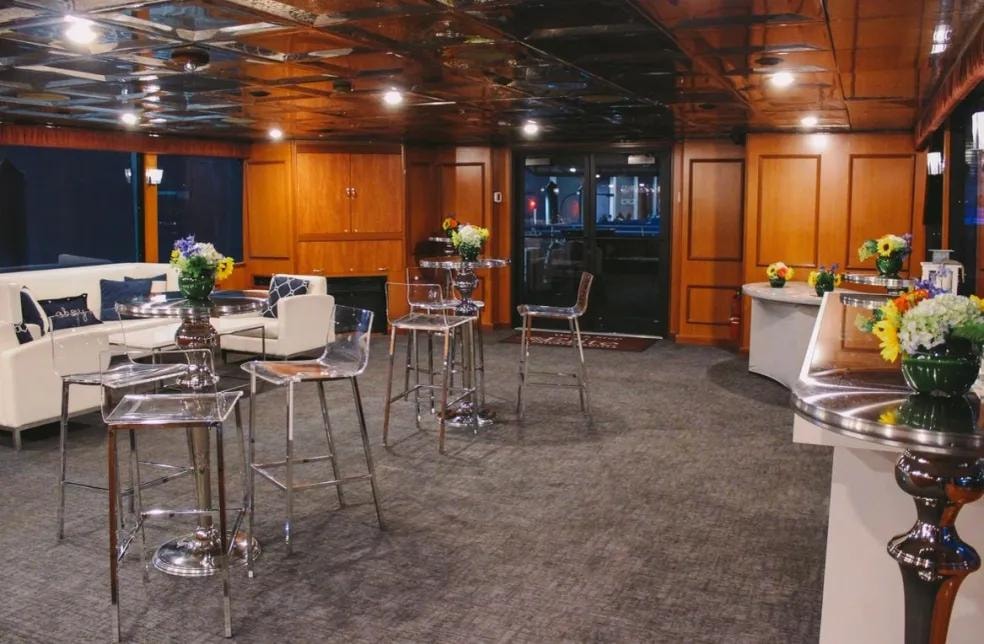 Seaport Elite II interior lounge with warm wood paneling