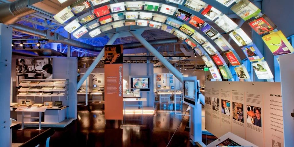 Computer History Museum Mobile Computing gallery with arched display of software covers