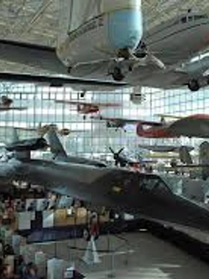 Museum of Flight interior with aircraft suspended from the ceiling